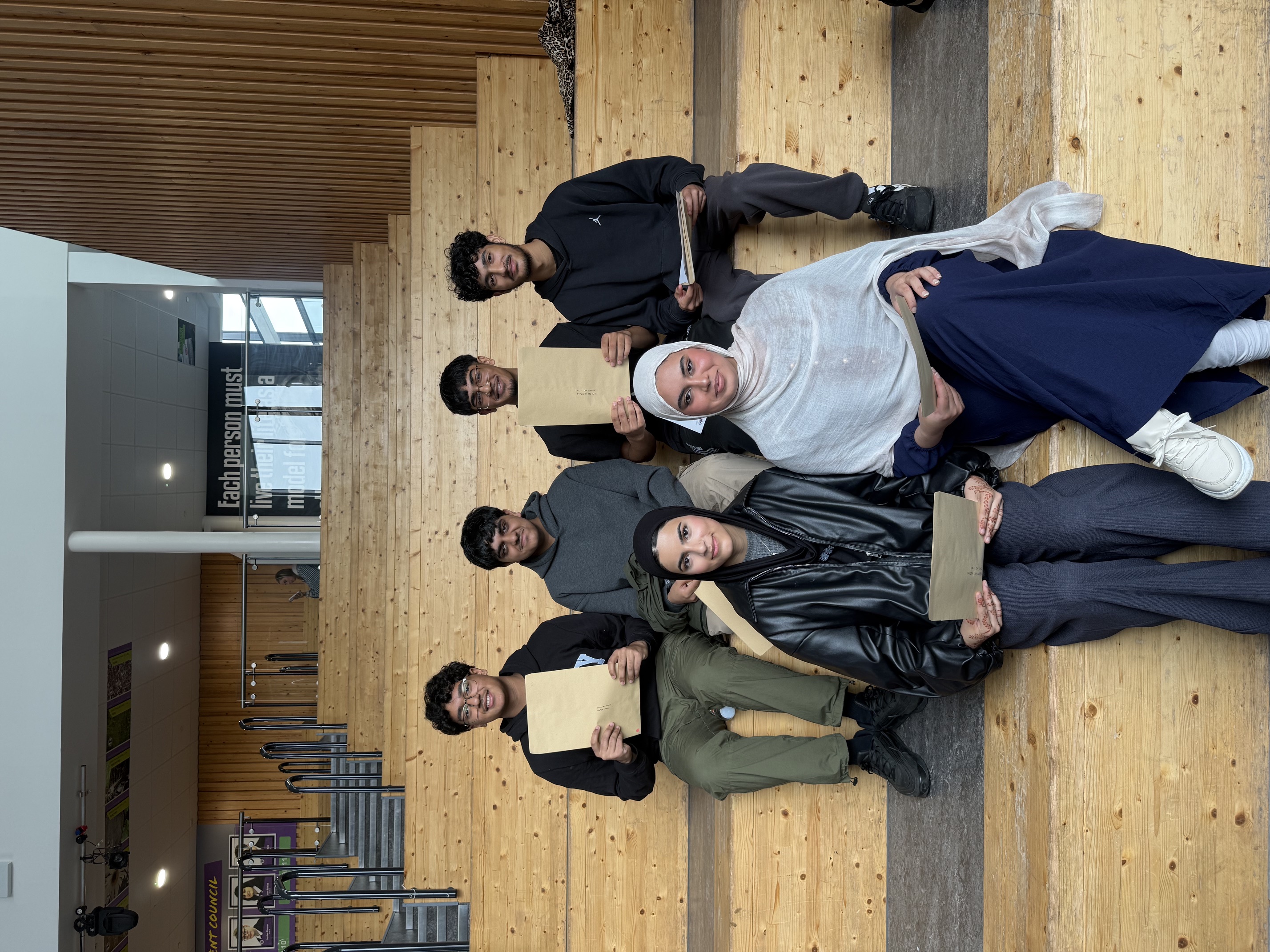 Students from E-ACT The Oldham Academy North after receiving their results